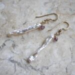 Freshwater pearl and mauveine sapphire line earrings