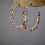 Nuanced color sapphire hoop earrings